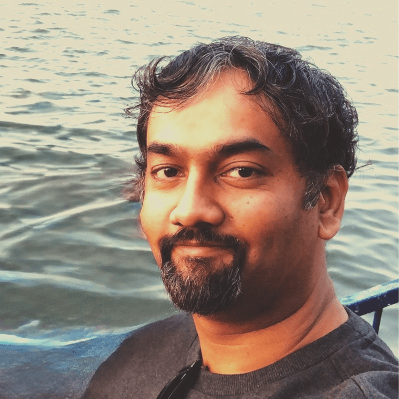 Portrait of Mihir by the water